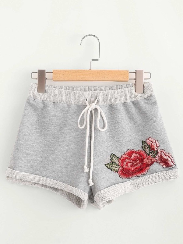 Shorts with embroidered flowers