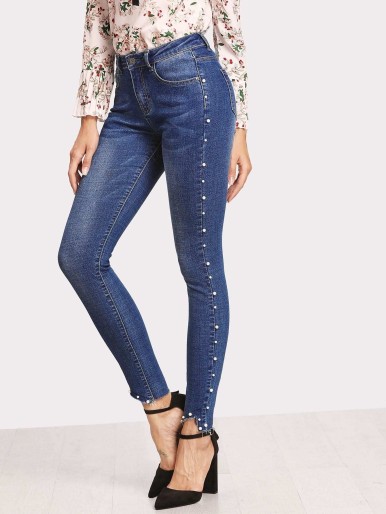 Skinny jeans with side pearls
