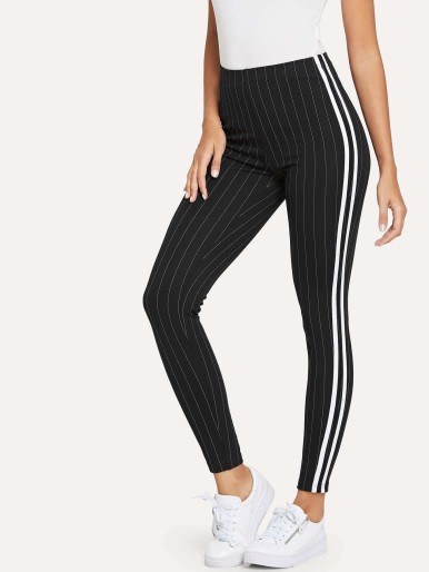 Side striped leggings with contrasting tape