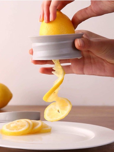 أداة تقطيع الليمون اليدوية