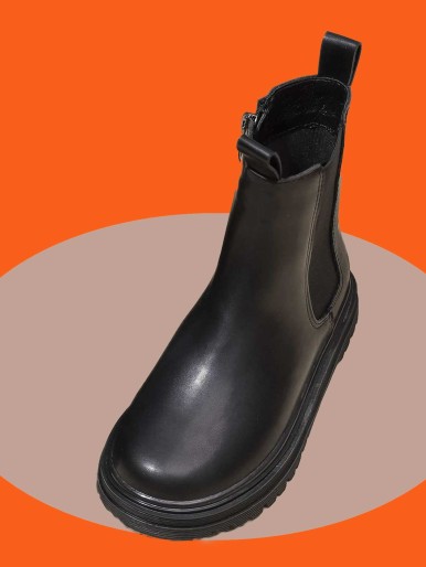Black leather high heel boots with rubber side and zipper inner side