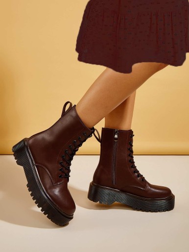 Combat boots with side zip and platform