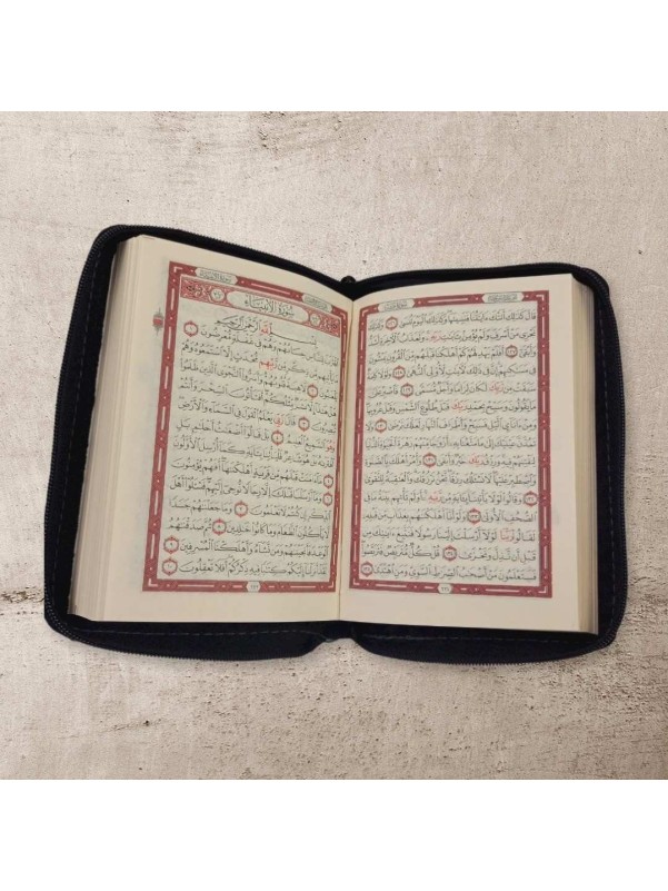 The Holy Quran is a black color with 14*10