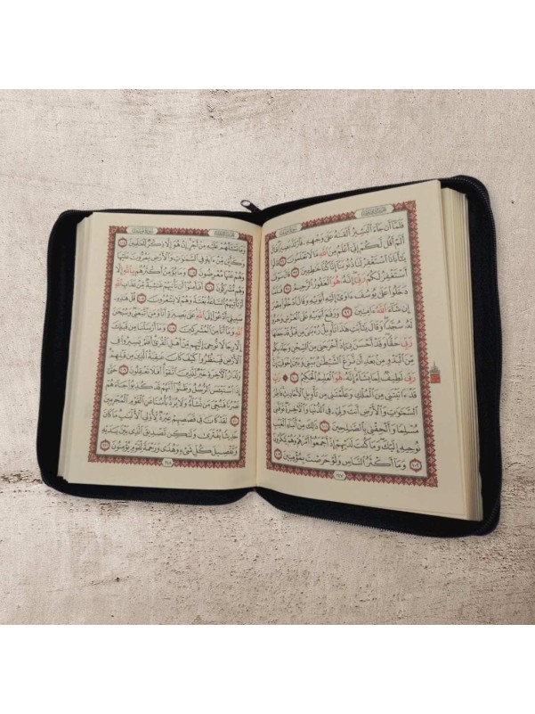 The Holy Quran is a black color with 16*10