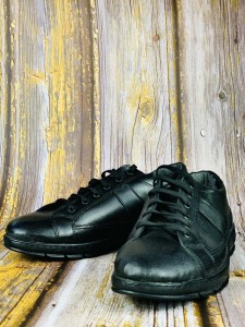 Glossy black men's sports shoes with black sole