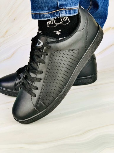 Black men's shoes with a black sole