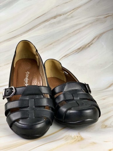 Comfortable black women's shoes with a buckle and medical leather straps