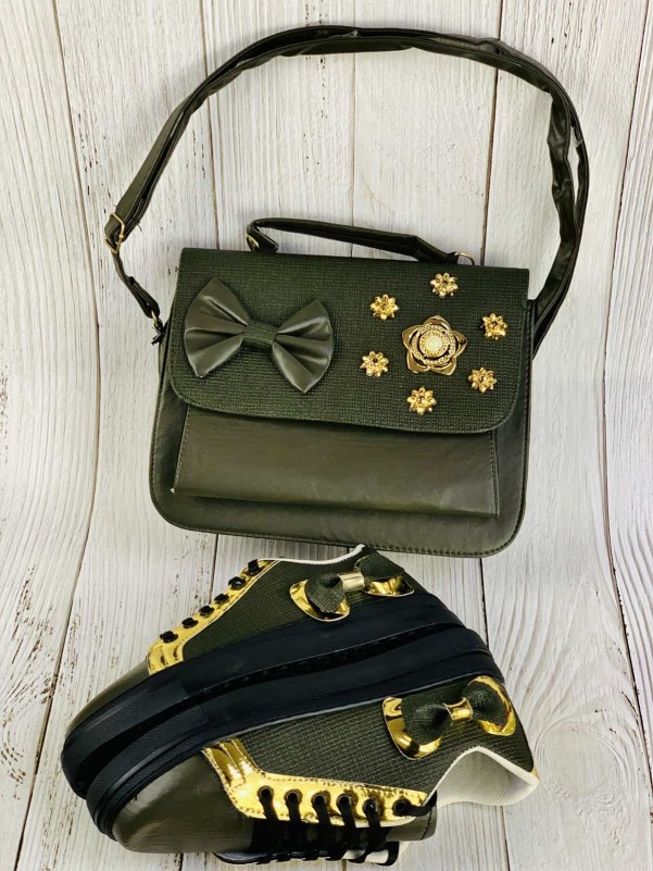 A bag, shoes and a purse, golden and olive, with a decorative knot in the form of a flower with fur