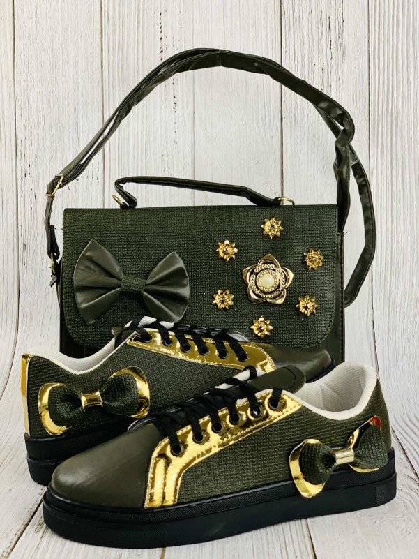 A bag, shoes and a purse, golden and olive, with a decorative knot in the form of a flower with fur