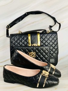 Stamped black bag, shoes and wallet