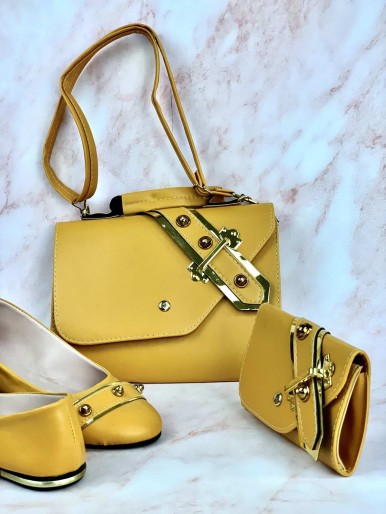 Yellow bag, shoes and wallet with a decorative metal ring