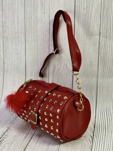 Red bag with golden pins and fur