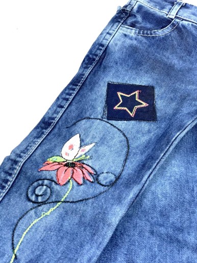 Girl's jeans with a floral pattern