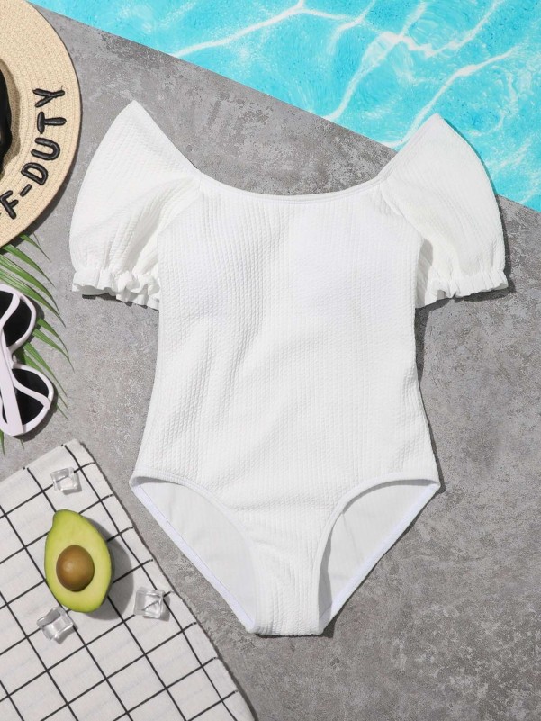 Plain white one store piece swimsuit