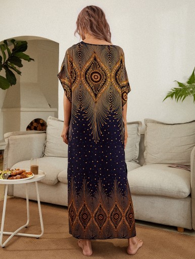 Kaftan dress with a scratch sleeve and graphic printing