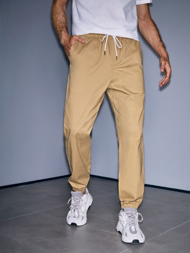 Men Drawstring Waist Slant Pocket Pants