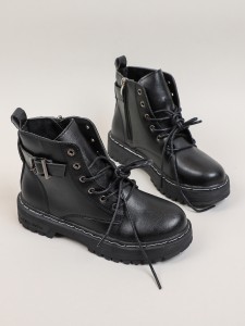 Lace-up boot with a metal eyelet