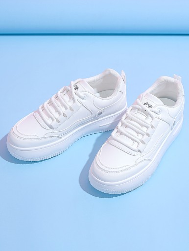White women's sports shoes with laces
