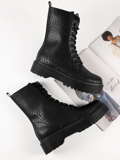 Black women's boots with a snakeskin print