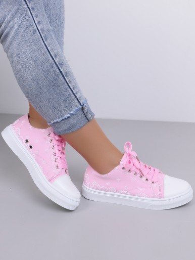 Pink sneakers with pink sole and laces