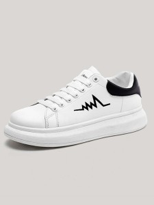 Black and white sports shoes with laces