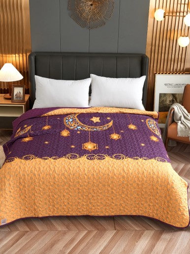 A golden and burgundy bedspread with a crescent print bed cover