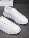 Leather sneakers with ventilation holes for foot comfort